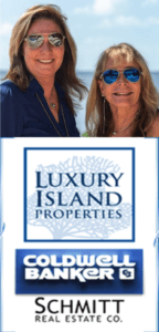 New picture of Jan and Charlotte wearing sun glasses with Luxury Island Properties Cold well Banker logo under photo